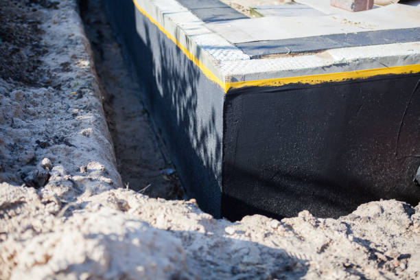 Professional Waterproofing technician working in Haywood, VA